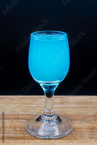 High-proof alcohol in a glass, bar, club.
 photo