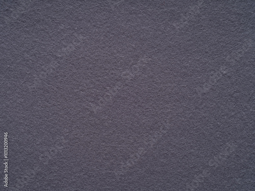 Charcoal grey felt texture conveys sophistication and modernity, suitable for sleek and contemporary designs