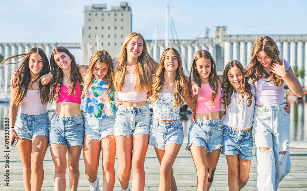 Happy teenagers or childs having fun together on city background Happy teenagers or childs having fun together on city background