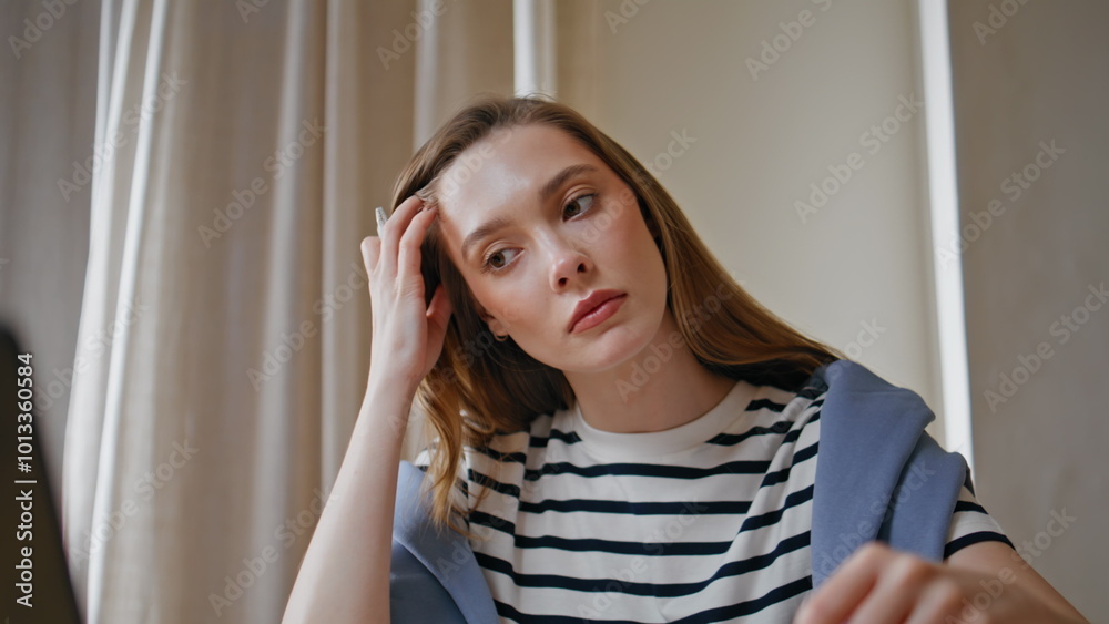 Thoughtful writer pondering idea at home desk closeup. Serious woman student Thoughtful writer pondering idea at home desk closeup. Serious woman student