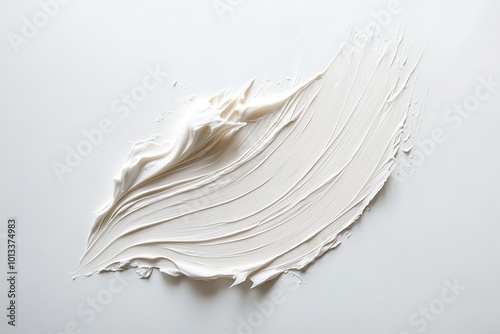 White smear of cosmetic cream isolated on white background. Creamy foundation texture isolated. photo