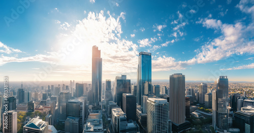 Aerial View of City Skyline and Skyscrapers Under Blue Sky and White Clouds