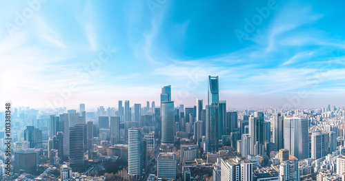 Aerial View of City Skyline and Skyscrapers Under Blue Sky and White Clouds