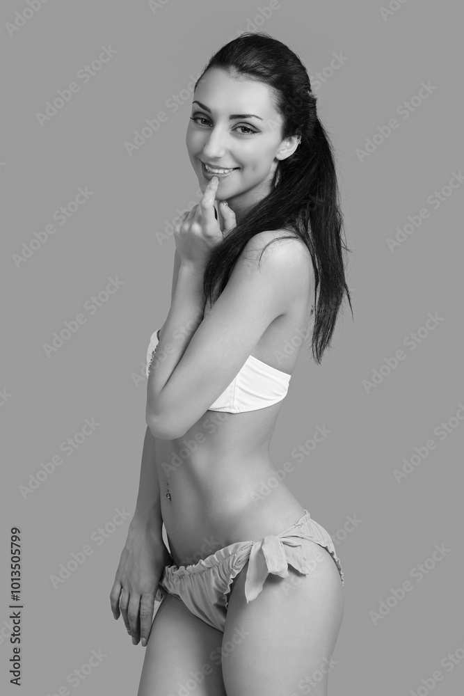 Naklejka premium young gorgeous blond woman in swimsuit
