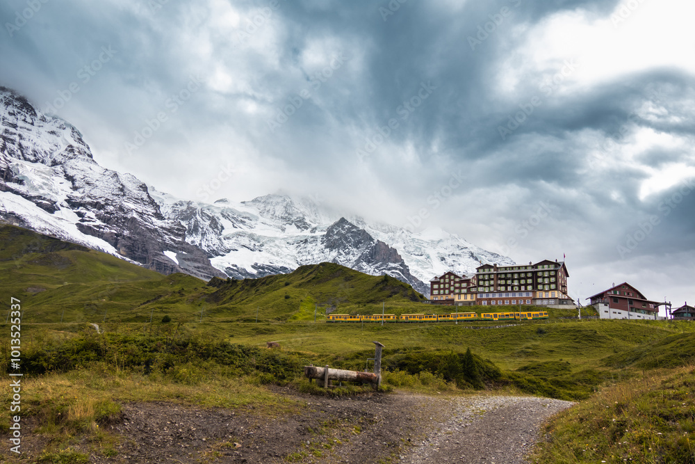 Stunning view of Eiger's north face and Grindelwald valley from Kleine Scheidegg, Grindelwald, Canton of Bern, Switzerland Stunning view of Eiger's north face and Grindelwald valley from Kleine Scheidegg, Grindelwald, Canton of Bern, Switzerland
