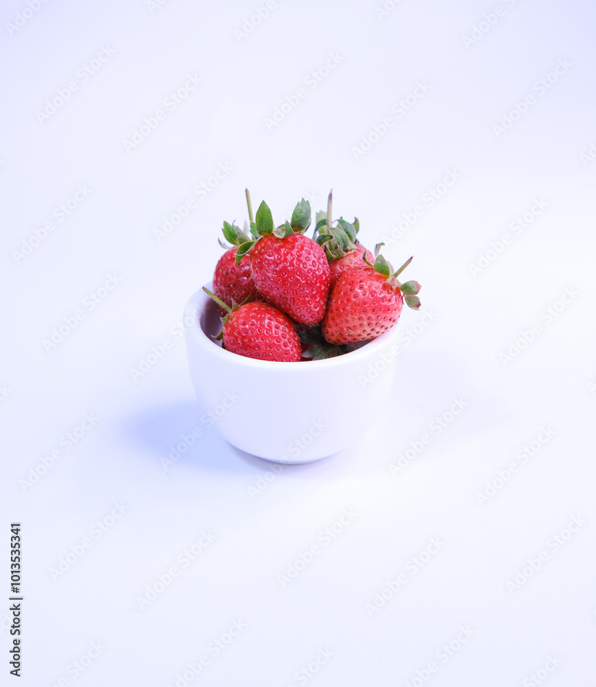 Ripe strawberries on white bowl Ripe strawberries on white bowl