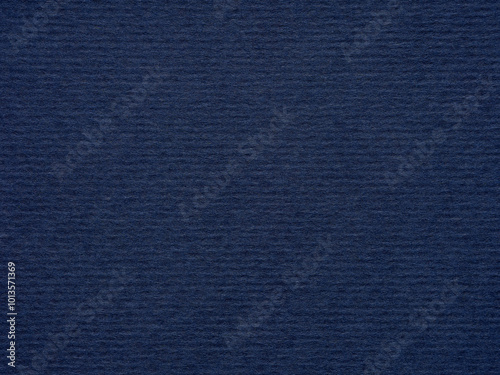 Obraz na płótnie Subtle yet profound, the deep blue paper texture conveys a sense of wisdom and introspective calm w salonie