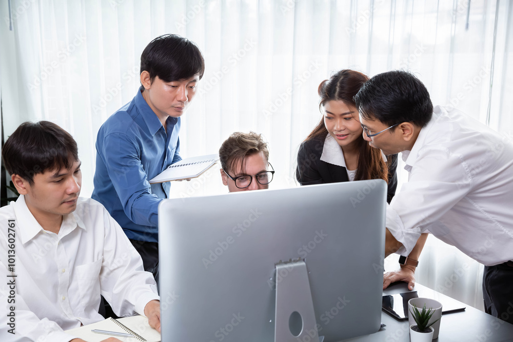 Group of diverse office worker employee working together on strategic business marketing planning in corporate office room. Positive teamwork in business workplace concept. Prudent Group of diverse office worker employee working together on strategic business marketing planning in corporate office room. Positive teamwork in business workplace concept. Prudent