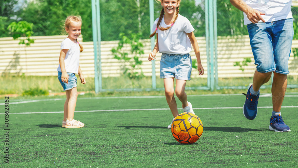 Obraz premium Active family football in free time