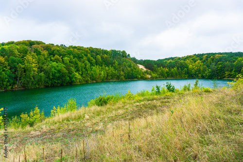 Jezioro Turkusowe, Wolin, Poland, zachodniopomorskie, Jezioro Turkusowe near Wapnica. Lake in Wolin National Park in Poland. Idyllic landscape with green nature by the lake. Turquoise lake.Beautifully