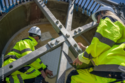 electric engineer or technician employed for inspection, maintenance, and repair of wind turbines for clean, sustainable energy and green ecological power concepts.alternative renewable wind energy 