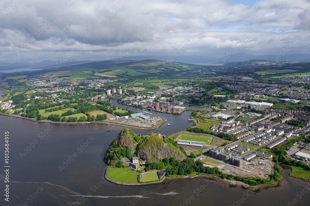Fototapeta premium Dumbarton castle building on volcanic rock aerial view from above Scotland