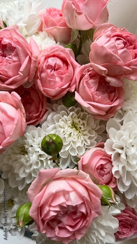 A beautiful bouquet of white asters and pink roses