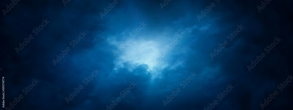 Abstract blue cloudy sky with light in the center. Abstract blue cloudy sky with light in the center.