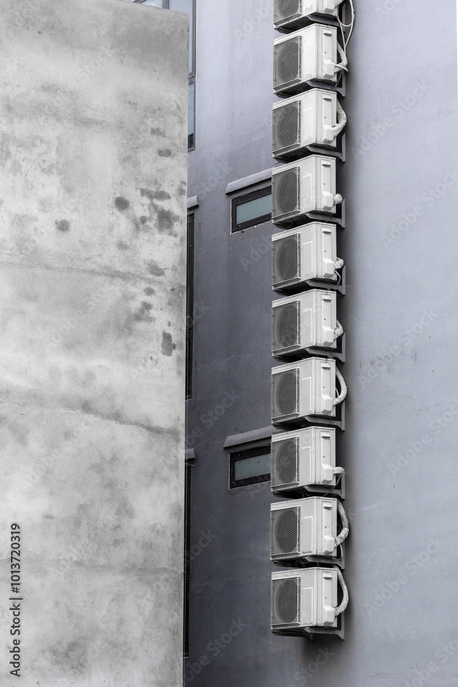Air conditioner units on building wall Air conditioner units on building wall