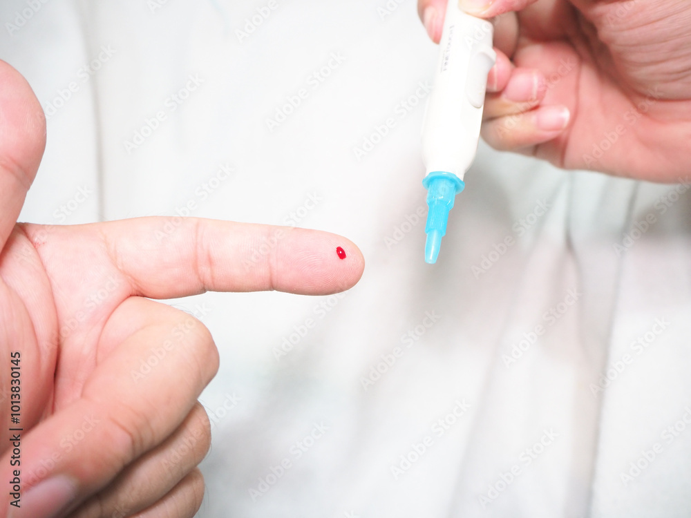 Healthcare and medical concept, The diabetic measures the level of glucose in the blood. Healthcare and medical concept, The diabetic measures the level of glucose in the blood.