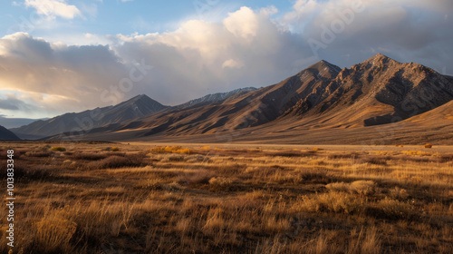 A stunning photo of a rarely seen mountain vista, taken during golden hour for soft, warm lighting