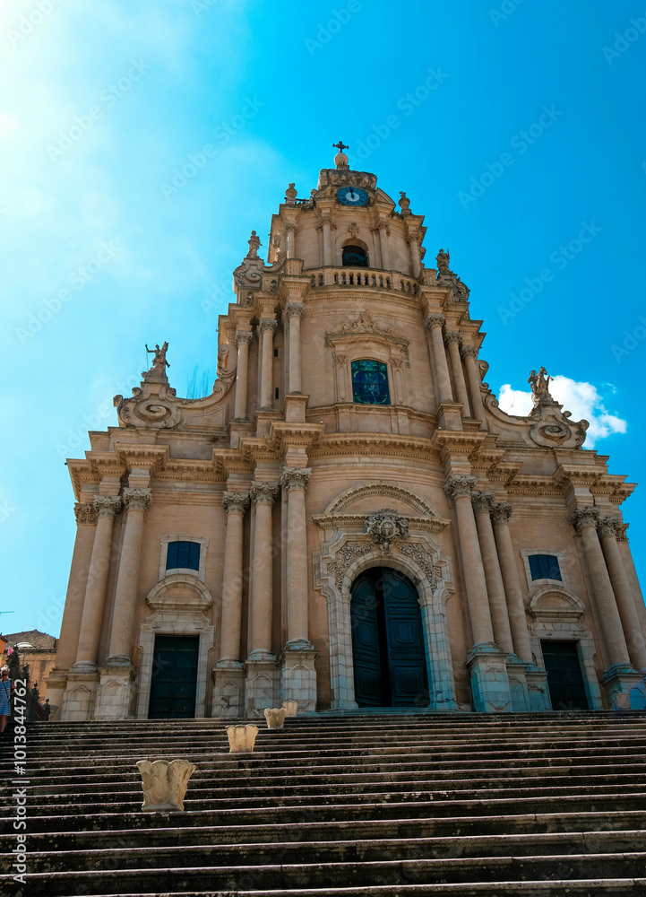 Obraz premium The famous collegiate church of San Giorgio (also known as the Cathedral of San Giorgio) is the main place of Catholic worship in Ragusa Ibla, one of the most important monuments of the city of Ragusa