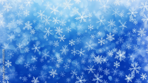 A background of white snowflakes on a blue background, creating an elegant and festive atmosphere for Christmas or New Year.