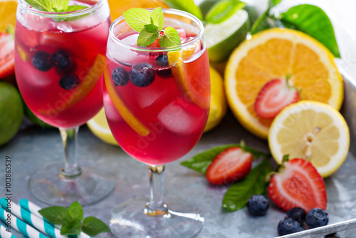 Ice cold red sangria with citrus fruits