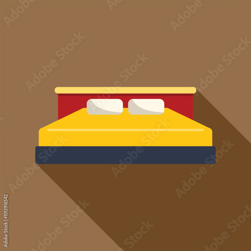 Yellow double bed with two pillows casting a long shadow on a brown background