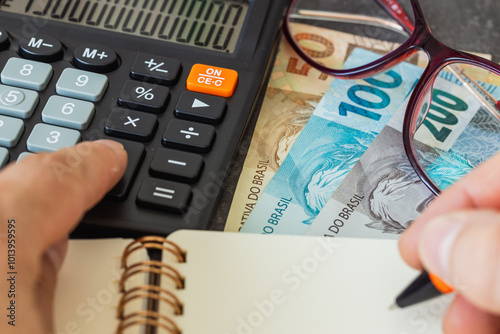 Wallpaper Mural Financial settlements in Brazilian reais, Financial analysis, Tax calculation, Risk costs, business project. Brazil money, close up. Torontodigital.ca