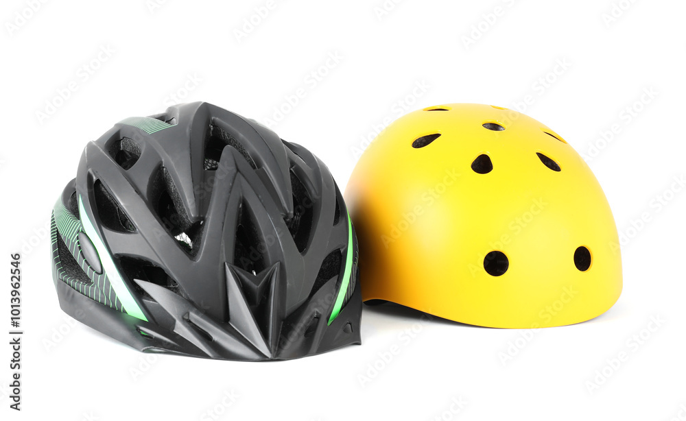 Fototapeta premium Different protective bicycle helmets isolated on white