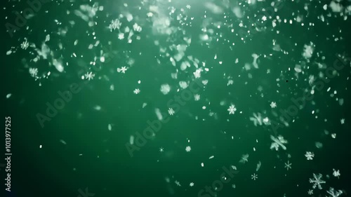 Falling snowflakes on a green gradient background with smooth transitions. video