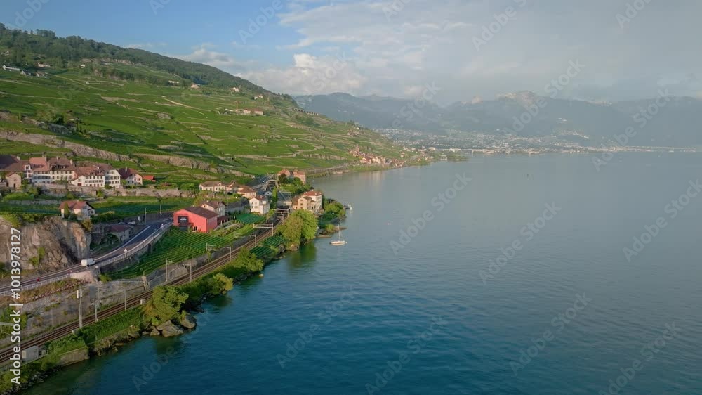 Aerial View of a Mountain Village in the Swiss Valley Overlooking Lake Geneva Aerial View of a Mountain Village in the Swiss Valley Overlooking Lake Geneva