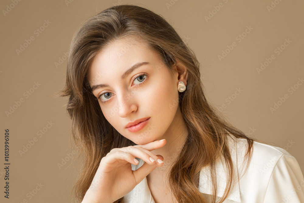 Beautiful young girl with jewelry. Studio portrait Beautiful young girl with jewelry. Studio portrait