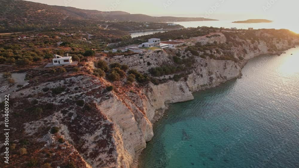 Beautiful sunset over a coastal cliff in a tranquil countryside setting Beautiful sunset over a coastal cliff in a tranquil countryside setting
