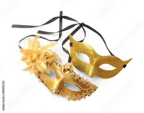 Beautiful golden carnival masks isolated on white, top view photo