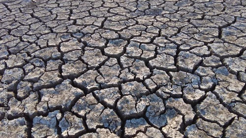 broken and cracked lands caused by drought, lands split open by thirst,