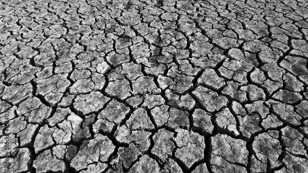 broken and cracked lands caused by drought, lands split open by thirst,