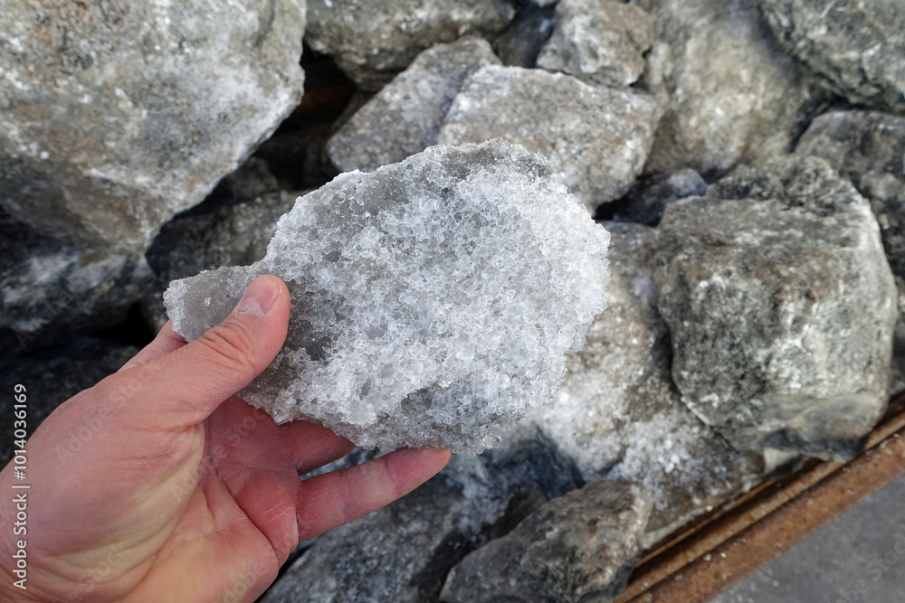 natural rock salt extracted from underground, close-up view of a large piece of rock salt,