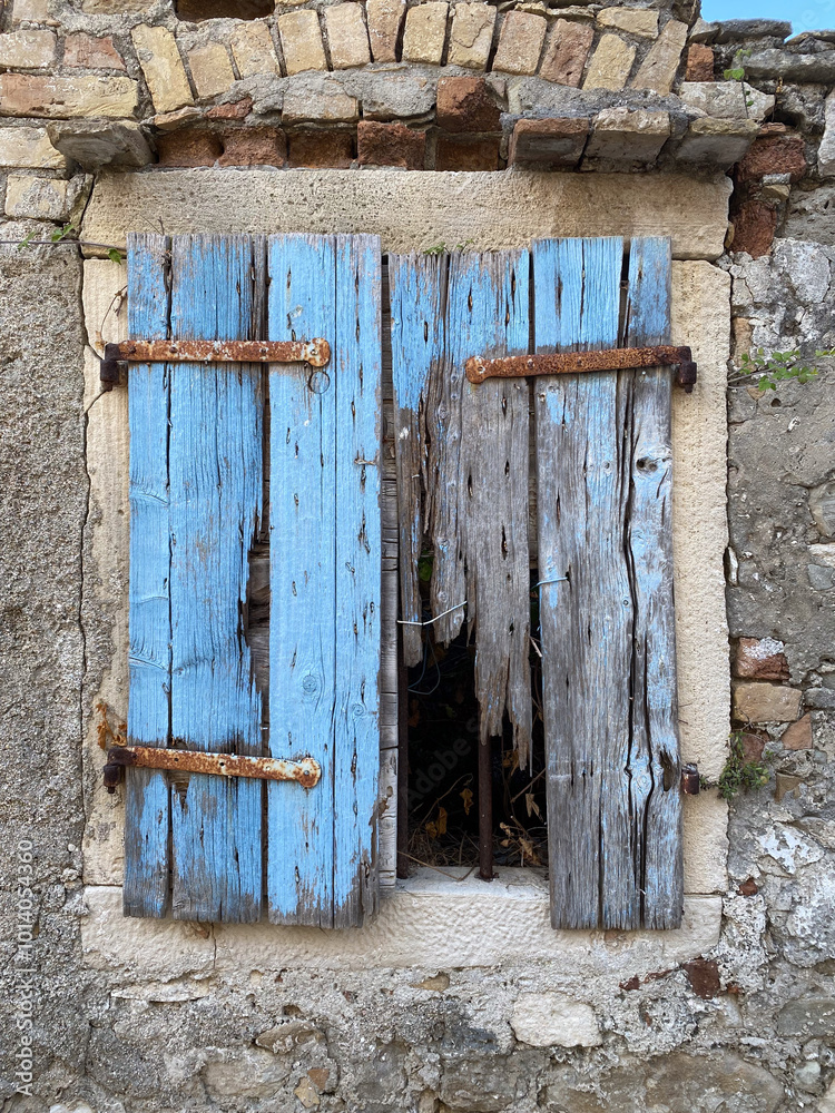 old wooden window with blue shutters, Greece corfu old wooden window with blue shutters, Greece corfu