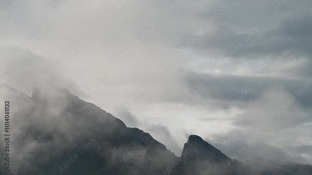Time lapse of mountain peaks surrounded by clouds and mist, Banff
Time lapse of mountain peaks surrounded by clouds and mist, Banff