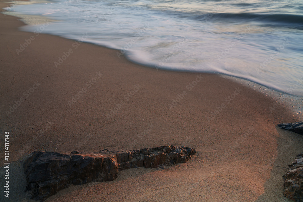 An atmospheric view of the sea, where the waves are washed away An atmospheric view of the sea, where the waves are washed away