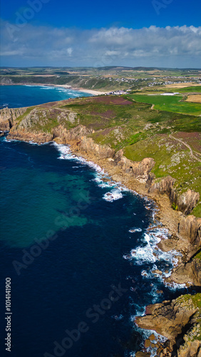 Aerial View of Rugged Coastline and Sandy Beach at Land's End, Cornwall, UK