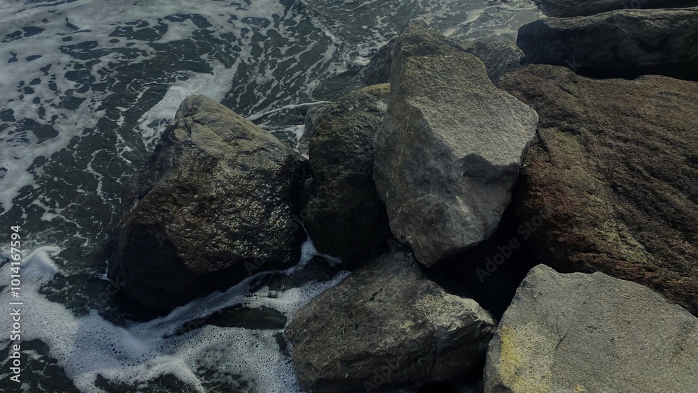 A powerful image of ocean waves crashing against rocky shores, showcasing the raw beauty of nature. A powerful image of ocean waves crashing against rocky shores, showcasing the raw beauty of nature.