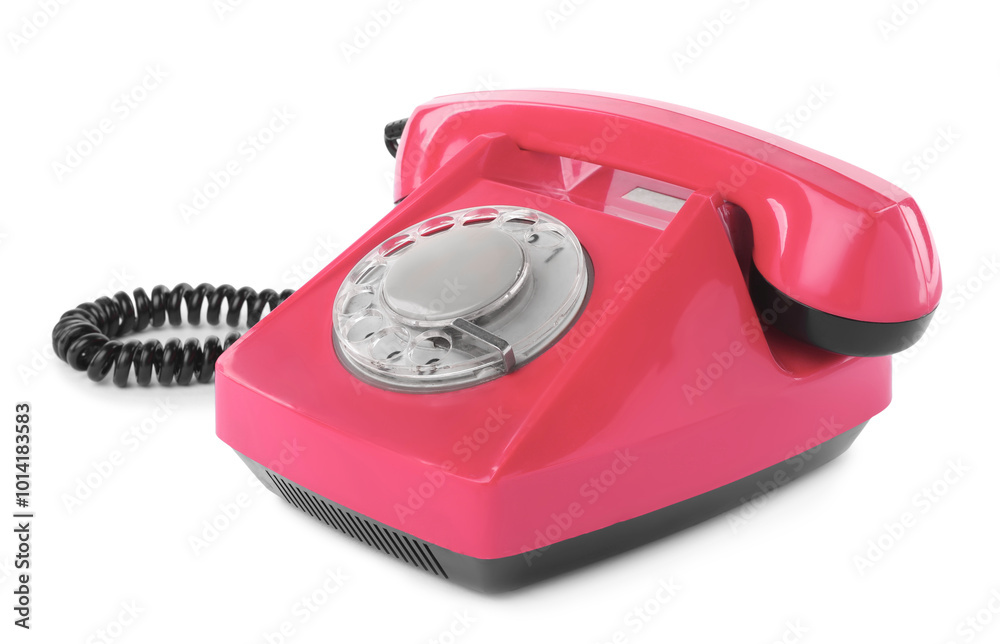 Old pink telephone with rotary dial isolated on white Old pink telephone with rotary dial isolated on white