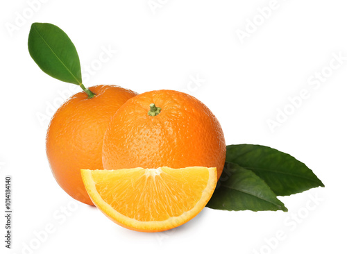 Fresh ripe oranges and green leaves on white background. Citrus fruit