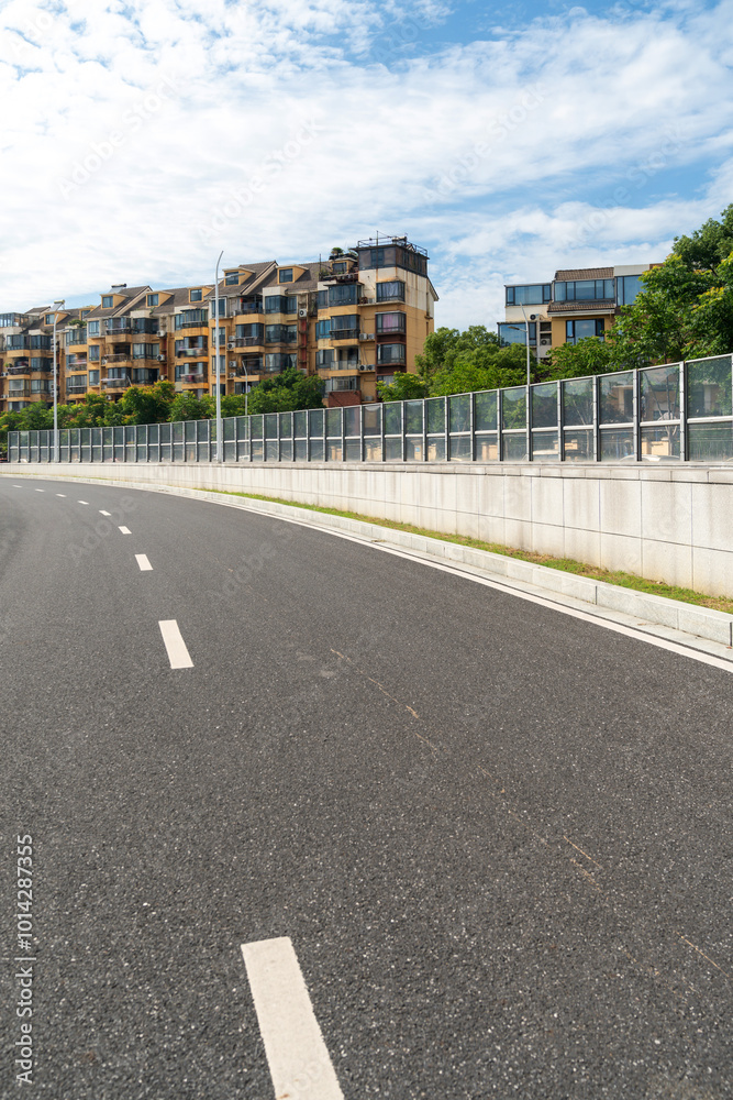 Empty urban road and buildings in the city Empty urban road and buildings in the city