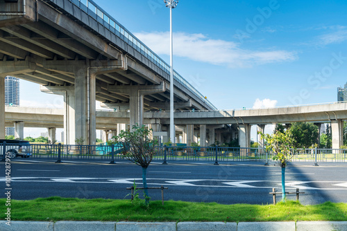 Concrete structure and asphalt road space under the overpass in the city