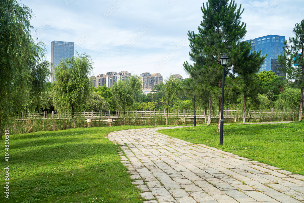 Fototapeta premium spring park and modern city
