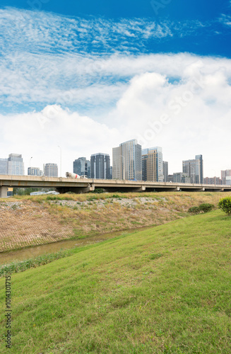 Highway overpass modern city skyline background