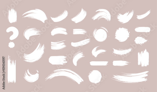 Set of Ink brush stroke silhouettes in various shapes and sizes