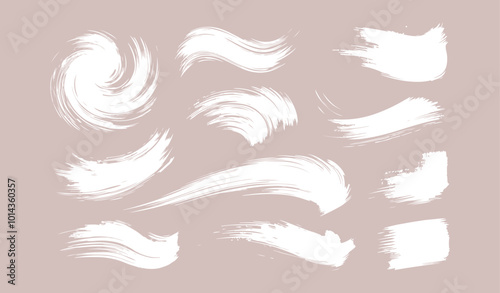 Set of Ink brush stroke silhouettes in various shapes and sizes