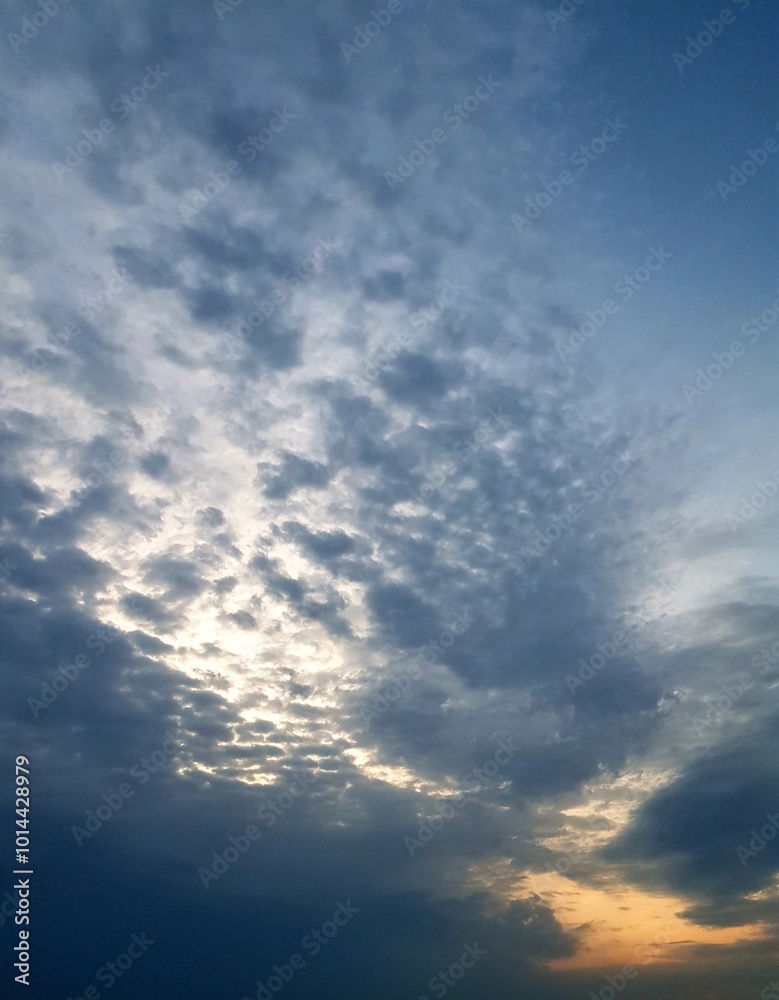 Fototapeta premium Sunset sky with clouds. Nature background. Sky with clouds and sun