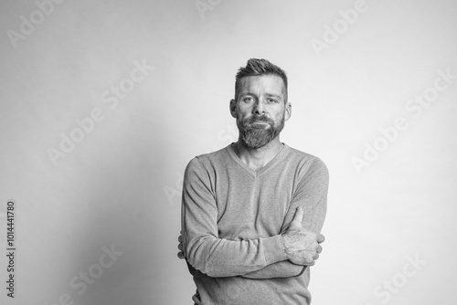 Studio shot of handsome businessman. Portrait of young businessman in suit.